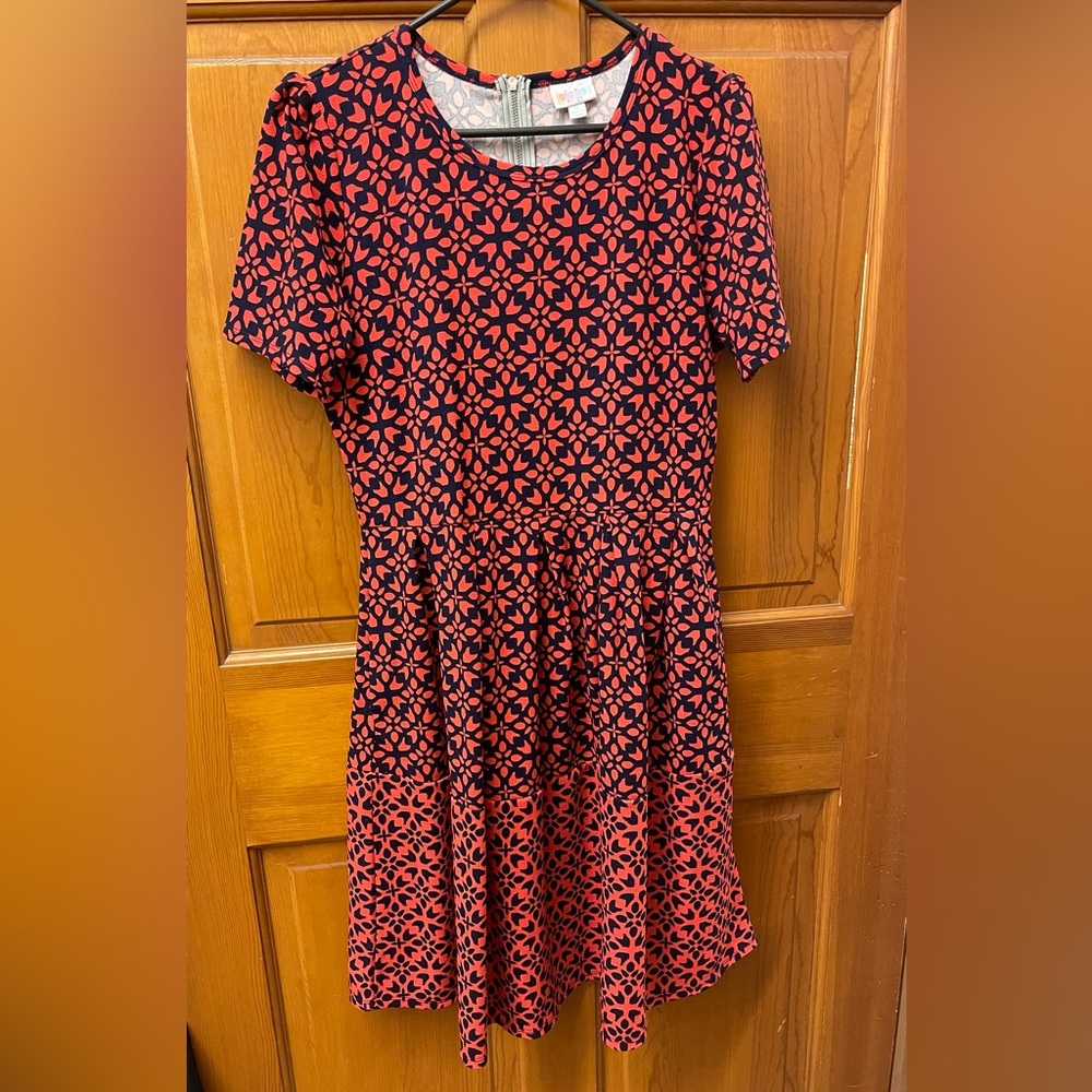 LuLaRoe Amelia Dress. New without tags. Beautiful dark coral and navy print.